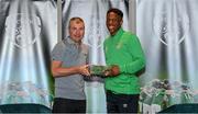 6 October 2021; Chiedozie Ogbene is presented with his 2020-2021 Republic of Ireland international cap by former Republic of Ireland player Denis Irwin during a presentation at their team hotel in Dublin. Photo by Stephen McCarthy/Sportsfile