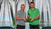 6 October 2021; Enda Stevens is presented with his 2020-2021 Republic of Ireland international cap by former Republic of Ireland player Denis Irwin during a presentation at their team hotel in Dublin. Photo by Stephen McCarthy/Sportsfile
