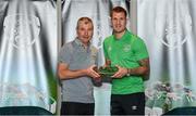 6 October 2021; James Collins is presented with his 2020-2021 Republic of Ireland international cap by former Republic of Ireland player Denis Irwin during a presentation at their team hotel in Dublin. Photo by Stephen McCarthy/Sportsfile