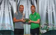 6 October 2021; Daryl Horgan is presented with his 2020-2021 Republic of Ireland international cap by former Republic of Ireland player Denis Irwin during a presentation at their team hotel in Dublin. Photo by Stephen McCarthy/Sportsfile