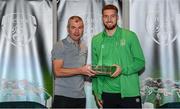 6 October 2021; Matt Doherty is presented with his 2020-2021 Republic of Ireland international cap by former Republic of Ireland player Denis Irwin during a presentation at their team hotel in Dublin. Photo by Stephen McCarthy/Sportsfile