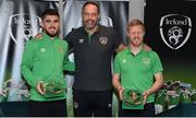 6 October 2021; Republic of Ireland's David Forde, sports physiologist, with Ryan Manning, left, and Daryl Horgan during the 2020-2021 Republic of Ireland international caps presentation at their team hotel in Dublin. Photo by Stephen McCarthy/Sportsfile