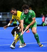5 October 2021; Daragh Walsh of Ireland in action against Razie Rahim of Malaysia during an international friendly match between Ireland and Malaysia at Lisnagarvey Hockey Club in Hillsborough, Down. Photo by Ramsey Cardy/Sportsfile
