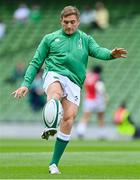 3 July 2021; Jordan Larmour of Ireland warms up before the International Rugby Friendly match between Ireland and Japan at Aviva Stadium in Dublin. Photo by Brendan Moran/Sportsfile