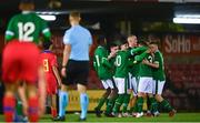 7 October 2021; Justin Ferizaj of Republic of Ireland, hidden, celebrates with team-mates after scoring their side's first goal during the UEFA U17 Championship Qualifier match between Republic of Ireland and Andorra at Turner's Cross in Cork. Photo by Eóin Noonan/Sportsfile