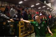 7 October 2021; Mark O'Mahony of Republic of Ireland with supporters after the UEFA U17 Championship Qualifier match between Republic of Ireland and Andorra at Turner's Cross in Cork. Photo by Eóin Noonan/Sportsfile