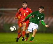 7 October 2021; Justin Ferizajv of Republic of Ireland in action against Gerard Estrada Quinquilla of Andorra during the UEFA U17 Championship Qualifier match between Republic of Ireland and Andorra at Turner's Cross in Cork. Photo by Eóin Noonan/Sportsfile