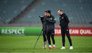 8 October 2021; Callum Robinson and Troy Parrott, left, assisted by videographer Matty Turnbull record footage during a Republic of Ireland training session at the Olympic Stadium in Baku, Azerbaijan. Photo by Stephen McCarthy/Sportsfile