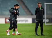 8 October 2021; Troy Parrott, left, and Callum Robinson with manager Stephen Kenny, right, during a Republic of Ireland training session at the Olympic Stadium in Baku, Azerbaijan. Photo by Stephen McCarthy/Sportsfile