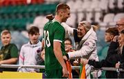 8 October 2021; Jake O'Brien of Republic of Ireland celebrates with his mother Richella Bennett, from Youghal in Cork, after the UEFA European U21 Championship Qualifier match between Republic of Ireland and Luxembourg at Tallaght Stadium in Dublin.  Photo by Sam Barnes/Sportsfile