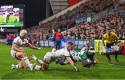 8 October 2021; Ratuva Tavuyara of Benetton dives over to score his side's first try despite the tackle of Nathan Doak of Ulster during the United Rugby Championship match between Ulster and Benetton at Kingspan Stadium in Belfast. Photo by Ramsey Cardy/Sportsfile