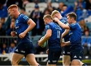 9 October 2021; Jordan Larmour of Leinster celebrates after scoring his side's second try with team-mates including Luke McGrath, left, during the United Rugby Championship match between Leinster and Zebre at the RDS Arena in Dublin. Photo by Harry Murphy/Sportsfile