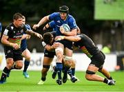 9 October 2021; Ryan Baird of Leinster is tackled by Renato Giammarioli and Luca Andreani of Zebre during the United Rugby Championship match between Leinster and Zebre at the RDS Arena in Dublin. Photo by Harry Murphy/Sportsfile
