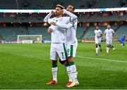 9 October 2021; Callum Robinson of Republic of Ireland celebrates with team-mate Adam Idah, right, after scoring his side's first goal during the FIFA World Cup 2022 qualifying group A match between Azerbaijan and Republic of Ireland at the Olympic Stadium in Baku, Azerbaijan. Photo by Stephen McCarthy/Sportsfile