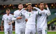 9 October 2021; Callum Robinson of Republic of Ireland celebrates after scoring his side's second goal with team-mates Matt Doherty, left, and Adam Idah during the FIFA World Cup 2022 qualifying group A match between Azerbaijan and Republic of Ireland at the Olympic Stadium in Baku, Azerbaijan. Photo by Stephen McCarthy/Sportsfile