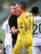 9 October 2021; Republic of Ireland manager Stephen Kenny celebrates with Republic of Ireland goalkeeper Gavin Bazunu after their side's victory in the FIFA World Cup 2022 qualifying group A match between Azerbaijan and Republic of Ireland at the Olympic Stadium in Baku, Azerbaijan. Photo by Stephen McCarthy/Sportsfile