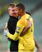 9 October 2021; Republic of Ireland manager Stephen Kenny celebrates with Republic of Ireland goalkeeper Gavin Bazunu after their side's victory in the FIFA World Cup 2022 qualifying group A match between Azerbaijan and Republic of Ireland at the Olympic Stadium in Baku, Azerbaijan. Photo by Stephen McCarthy/Sportsfile