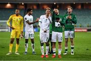 9 October 2021; Republic of Ireland players, including Callum Robinson and Enda Stevens, after their victory in the FIFA World Cup 2022 qualifying group A match between Azerbaijan and Republic of Ireland at the Olympic Stadium in Baku, Azerbaijan. Photo by Stephen McCarthy/Sportsfile