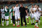9 October 2021; Republic of Ireland manager Stephen Kenny with John Egan of Republic of Ireland after their victory in the FIFA World Cup 2022 qualifying group A match between Azerbaijan and Republic of Ireland at the Olympic Stadium in Baku, Azerbaijan. Photo by Stephen McCarthy/Sportsfile