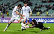 9 October 2021; Troy Parrott of Republic of Ireland in action against Azerbaijan goalkeeper Shakhrudin Magomedaliyev during the FIFA World Cup 2022 qualifying group A match between Azerbaijan and Republic of Ireland at the Olympic Stadium in Baku, Azerbaijan. Photo by Stephen McCarthy/Sportsfile