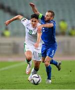9 October 2021; Jamie McGrath of Republic of Ireland and Maksim Medvedev of Azerbaijan during the FIFA World Cup 2022 qualifying group A match between Azerbaijan and Republic of Ireland at the Olympic Stadium in Baku, Azerbaijan. Photo by Stephen McCarthy/Sportsfile