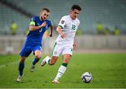 9 October 2021; Jamie McGrath of Republic of Ireland and Maksim Medvedev of Azerbaijan during the FIFA World Cup 2022 qualifying group A match between Azerbaijan and Republic of Ireland at the Olympic Stadium in Baku, Azerbaijan. Photo by Stephen McCarthy/Sportsfile