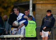 9 October 2021; Castleknock manager Eoin Dennehy with Nathan Mullins of St Vincent's during the Go Ahead Dublin County Senior Club Football Championship Group 2 match between Castleknock and St Vincent's at Naul in Dublin. Photo by David Fitzgerald/Sportsfile