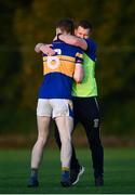 9 October 2021; Castleknock manager Eoin Dennehy celebrates with Senan Forker after the Go Ahead Dublin County Senior Club Football Championship Group 2 match between Castleknock and St Vincent's at Naul in Dublin. Photo by David Fitzgerald/Sportsfile
