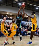 9 October 2021; Aaron Calixte of Garvey's Tralee Warriors in action against Simon Francis, left, Declan Wall and Jeremy Lereizo Meda of Team 360 Financial Killorglin during the InsureMyVan.ie Men's SuperLeague South Conference match between Garveys Tralee Warriors and Team 360 Financial Killorglin at Tralee Sports Complex in Tralee, Kerry. Photo by Brendan Moran/Sportsfile