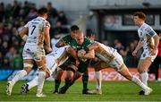 9 October 2021; Jordan Duggan of Connacht is tackled by Aki Seiuli, left, and Elliot Dee of Dragons during the United Rugby Championship match between Connacht and Dragons at The Sportsground in Galway. Photo by Seb Daly/Sportsfile