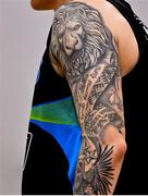 9 October 2021; A tattoo on the arm of Ronalds Elksnis of Garvey's Tralee Warriors during the InsureMyVan.ie Men's SuperLeague South Conference match between Garveys Tralee Warriors and Team 360 Financial Killorglin at Tralee Sports Complex in Tralee, Kerry. Photo by Brendan Moran/Sportsfile