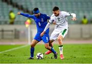 9 October 2021; Matt Doherty of Republic of Ireland in action against Emin Makhmudov of Azerbaijan during the FIFA World Cup 2022 qualifying group A match between Azerbaijan and Republic of Ireland at the Olympic Stadium in Baku, Azerbaijan. Photo by Stephen McCarthy/Sportsfile