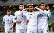 9 October 2021; Callum Robinson celebrates with Republic of Ireland team-mates Matt Doherty, left, and Adam Idah, right, after scoring their second goal during the FIFA World Cup 2022 qualifying group A match between Azerbaijan and Republic of Ireland at the Olympic Stadium in Baku, Azerbaijan. Photo by Stephen McCarthy/Sportsfile