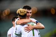 9 October 2021; Callum Robinson is congratulated by Republic of Ireland team-mate John Egan of Republic of Ireland after scoring their second goal during the FIFA World Cup 2022 qualifying group A match between Azerbaijan and Republic of Ireland at the Olympic Stadium in Baku, Azerbaijan. Photo by Stephen McCarthy/Sportsfile