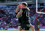 10 October 2021; Liam Coombes, right, of Munster celebrates with team-mate Neil Cronin after scoring his side's second try during the United Rugby Championship match between Scarlets and Munster at Parc Y Scarlets in Llanelli, Wales. Photo by Gareth Everett/Sportsfile