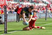 10 October 2021; Calvin Nash of Munster dives in to score try during the United Rugby Championship match between Scarlets and Munster at Parc Y Scarlets in Llanelli, Wales. Photo by Gareth Everett/Sportsfile