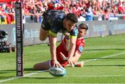 10 October 2021; Calvin Nash of Munster dives in to score try during the United Rugby Championship match between Scarlets and Munster at Parc Y Scarlets in Llanelli, Wales. Photo by Gareth Everett/Sportsfile