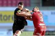 10 October 2021; Thomas Ahern of Munster is tackled by Samson Lee of Scarlets during the United Rugby Championship match between Scarlets and Munster at Parc Y Scarlets in Llanelli, Wales. Photo by Gareth Everett/Sportsfile