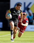 10 October 2021; Calvin Nash of Munster evades the tackle of Steff Evans of Scarlets during the United Rugby Championship match between Scarlets and Munster at Parc Y Scarlets in Llanelli, Wales. Photo by Gareth Everett/Sportsfile