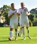 10 October 2021; Maksymilian Dziuba of Poland, left, celebrates after scoring his side's first goal during the UEFA U17 Championship Qualifying Round Group 5 match between Poland and Andorra at The Mardyke in Cork. Photo by Eóin Noonan/Sportsfile