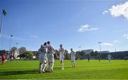 10 October 2021; Maksymilian Dziuba of Poland, hidden, celebrates with team-mates after scoring their side's first goal during the UEFA U17 Championship Qualifying Round Group 5 match between Poland and Andorra at The Mardyke in Cork. Photo by Eóin Noonan/Sportsfile