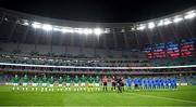 9 October 2021; Players of Republic of Ireland and Azerbaijan line up for their national anthems before the FIFA World Cup 2022 qualifying group A match between Azerbaijan and Republic of Ireland at the Olympic Stadium in Baku, Azerbaijan. Photo by Stephen McCarthy/Sportsfile