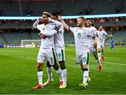 9 October 2021; Callum Robinson of Republic of Ireland celebrates after scoring his side's first goal with team-mates Adam Idah and Daryl Horgan, right, during the FIFA World Cup 2022 qualifying group A match between Azerbaijan and Republic of Ireland at the Olympic Stadium in Baku, Azerbaijan. Photo by Stephen McCarthy/Sportsfile
