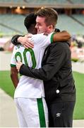 9 October 2021; Republic of Ireland's Chiedozie Ogbene with Kieran Crowley, FAI communications executive, following the FIFA World Cup 2022 qualifying group A match between Azerbaijan and Republic of Ireland at the Olympic Stadium in Baku, Azerbaijan. Photo by Stephen McCarthy/Sportsfile