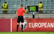 9 October 2021; Referee Espen Eskas refers to the VAR screen during the FIFA World Cup 2022 qualifying group A match between Azerbaijan and Republic of Ireland at the Olympic Stadium in Baku, Azerbaijan. Photo by Stephen McCarthy/Sportsfile