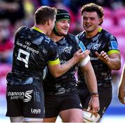 10 October 2021; Chris Cloete of Munster, second from left, celebrates scoring his side's sixth try with team-mates during the United Rugby Championship match between Scarlets and Munster at Parc Y Scarlets in Llanelli, Wales. Photo by Ben Evans/Sportsfile