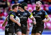 10 October 2021; Chris Cloete of Munster, centre, celebrates scoring his side's sixth try with team-mates during the United Rugby Championship match between Scarlets and Munster at Parc Y Scarlets in Llanelli, Wales. Photo by Ben Evans/Sportsfile