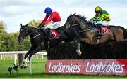 10 October 2021; Ontheropes, left, with Sean O'Keeffe up, jumps the last on their way to winning the JT McNamara Ladbrokes Munster National Handicap Steeplechase, from second place A Wave Of The Sea, with Simon Torrens up, at Limerick Racecourse in Patrickswell, Limerick. Photo by Seb Daly/Sportsfile