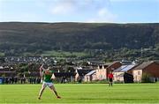 10 October 2021; Conal Cunning of Dunloy hits a free during the Antrim County Senior Club Hurling Championship Final match between Dunloy and O'Donovan Rossa at Corrigan Park in Belfast. Photo by Ramsey Cardy/Sportsfile