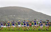 10 October 2021; Both teams parade before the Antrim County Senior Club Hurling Championship Final match between Dunloy and O'Donovan Rossa at Corrigan Park in Belfast. Photo by Ramsey Cardy/Sportsfile